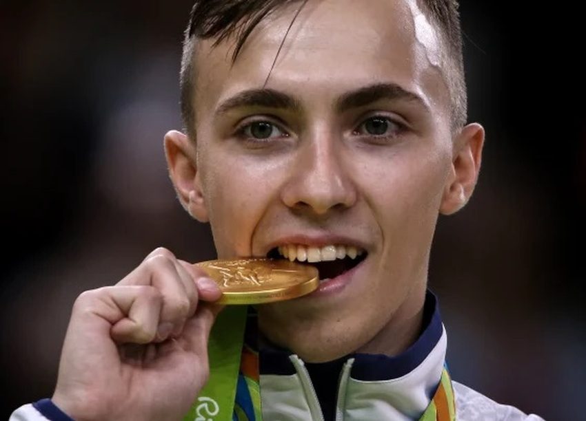 olimpijada sportisti griženje medalja