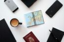 Pasoš Republike Srbije, otvoreni spiralni blok sa mapom Evrope, šolja kafe i sveske